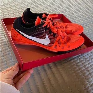 Bright orange and black Nike track spikes multi-use 7